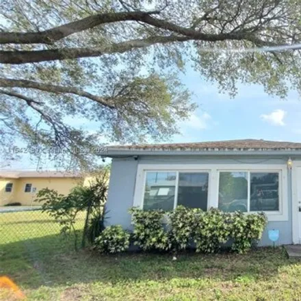 Rent this 3 bed house on 2182 Scott Street in Hollywood, FL 33020