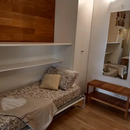 Rent this 2 bed room on Viale Carlo Espinasse in 34, 20156 Milan MI