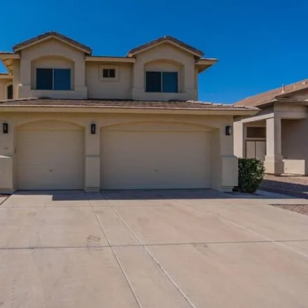 Buy this 4 bed house on 3689 East Feather Avenue in Gilbert, AZ 85234