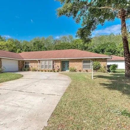 Buy this 4 bed house on 260 Country Circle Drive East in Port Orange, FL 32128