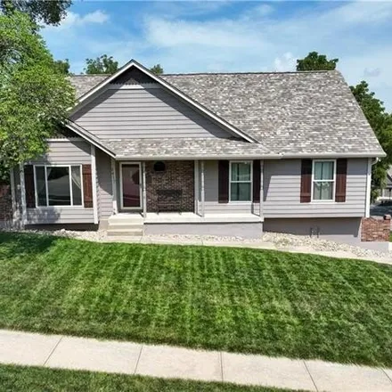 Buy this 4 bed house on 1365 Southwest Stonecreek Drive in Blue Springs, MO 64015