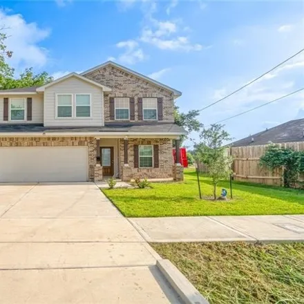 Rent this 4 bed house on 4685 Mallow Street in Sunny Side, Houston