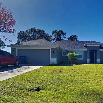 Rent this 4 bed house on 950 Cloverleaf Avenue Southeast in Palm Bay, FL 32909