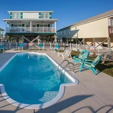 Buy this 6 bed house on 1391 West Lagoon Avenue in Gulf Shores, AL 36542