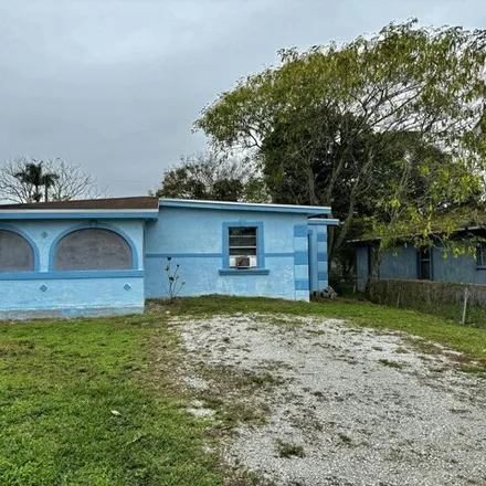 Buy this 4 bed house on 165 Northwest 11th Avenue in South Bay, Palm Beach County