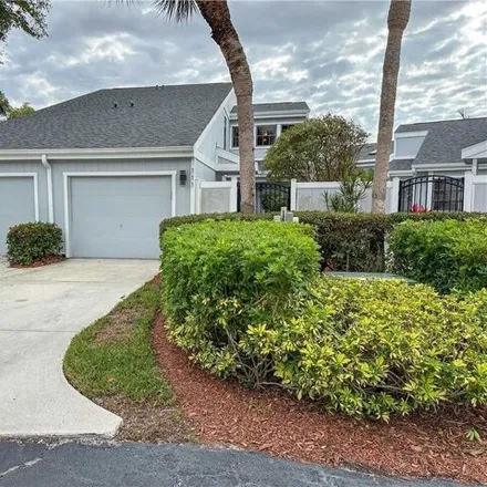 Rent this 3 bed house on 216 Woodshire Lane in Collier County, FL 34105