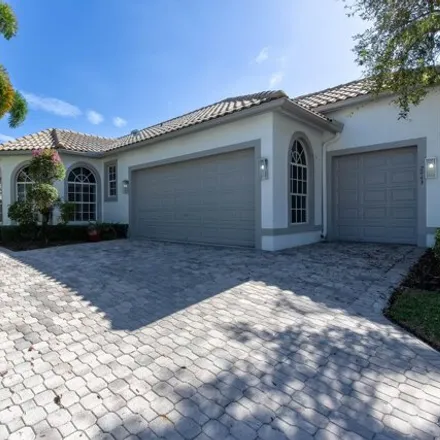 Buy this 3 bed house on 2383 Players Court in Wellington, FL 33414