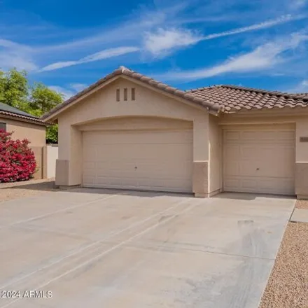 Buy this 3 bed house on 5160 West Village Drive in Glendale, AZ 85308