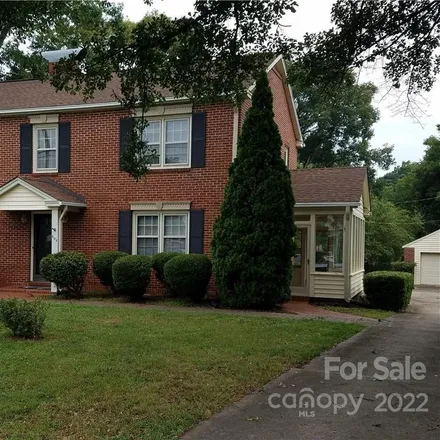 Buy this 4 bed house on 504 West Trade Street in Dallas, NC 28034