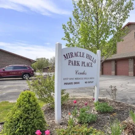 Buy this 2 bed house on Miracle Hills Park Place in 11937 Miracle Hills Drive, Omaha