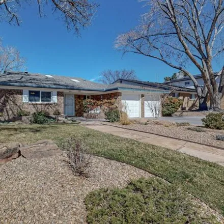 Buy this 4 bed house on 8267 Pickard Avenue Northeast in Albuquerque, NM 87110