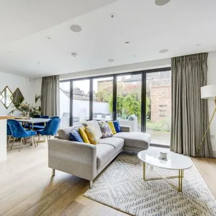 Buy this 3 bed townhouse on 14 Rainsborough Square in London, SW6 1DQ