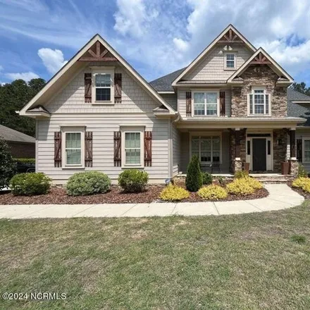 Rent this 4 bed house on 30 Spearhead Drive in Whispering Pines, Moore County