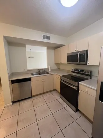 Rent this 3 bed condo on 1068 Golden Lakes Boulevard in Golden Lakes, Palm Beach County
