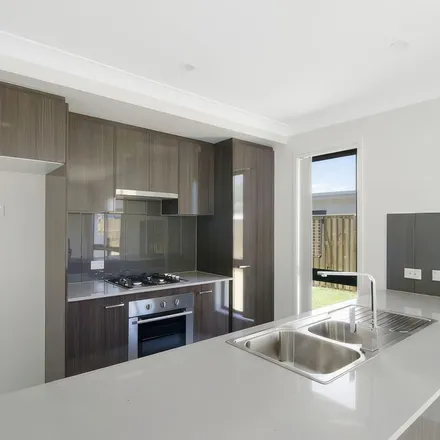 Rent this 4 bed apartment on Fannon Court in Pimpama QLD 4209, Australia