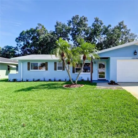 Rent this 3 bed house on 12098 84th Avenue in Pinellas County, FL 33772