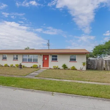 Buy this 4 bed house on 1862 Barkley Avenue in Melbourne, FL 32935