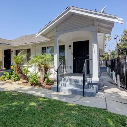 Buy this 3 bed house on 5467 South Saint Andrew's Place in Los Angeles, CA 90062