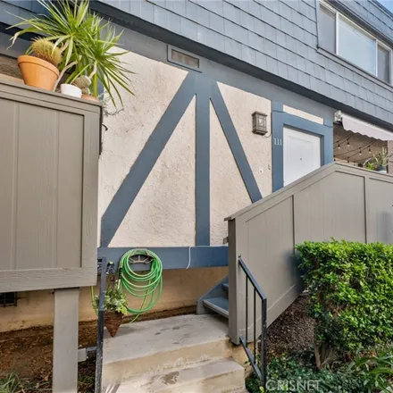 Buy this 3 bed townhouse on 18550 Hatteras Street in Los Angeles, CA 91356