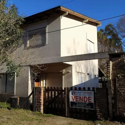 Buy this 3 bed house on Calle 58 1366 in Partido de General Belgrano, General Belgrano