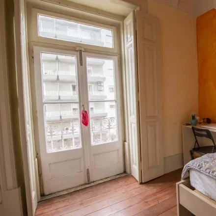 Rent this 7 bed room on Avenida 5 de Outubro in 1050-048 Lisbon, Portugal