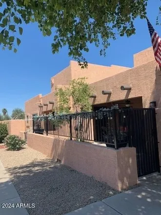 Buy this 2 bed townhouse on 8940 West Olive Avenue in Peoria, AZ 85345
