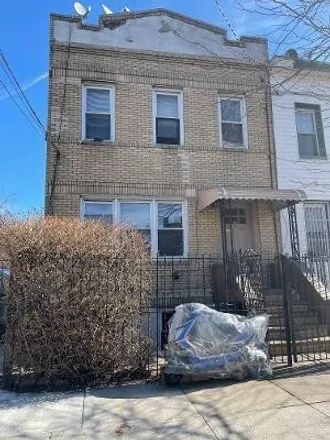 Buy this 5 bed townhouse on 117 Bradford Street in New York, NY 11207