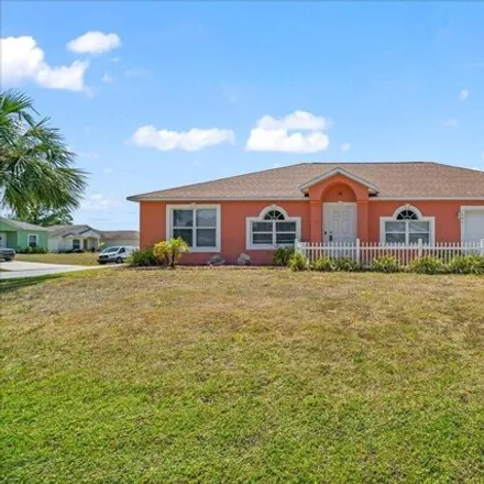 Buy this 4 bed house on 1307 Ginza Road Northwest in Palm Bay, FL 32907