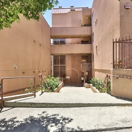 Buy this 2 bed condo on College & Centennial in College Street, Los Angeles