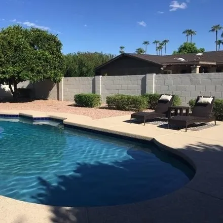 Rent this 4 bed house on 8064 East del Caverna Drive in Scottsdale, AZ 85258