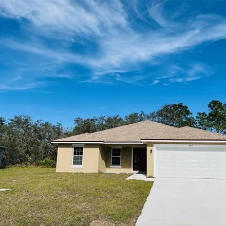 Rent this 4 bed house on Saint Johns Lane in Polk County, FL 33840