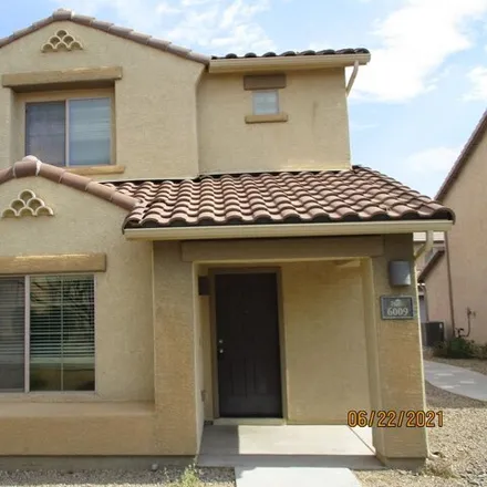 Rent this 3 bed house on South Cedar Elm Lane in Tucson, AZ 85747
