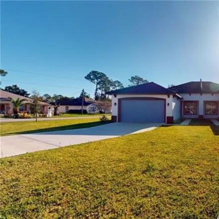Buy this 12 bed house on 45 Wheatfield Drive in Palm Coast, FL 32164