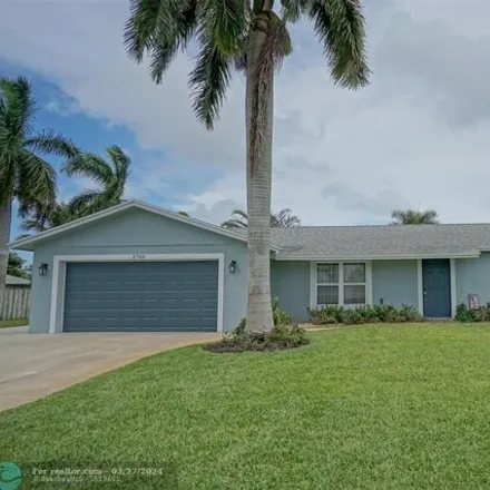 Buy this 4 bed house on 1094 Southwest 27th Place in Chapel Hill, Boynton Beach
