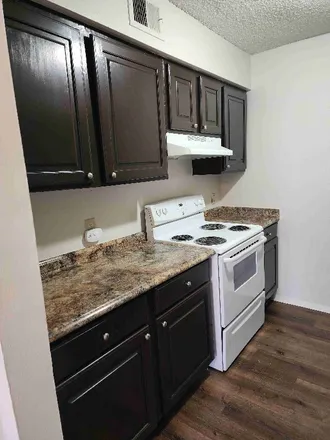 Rent this 2 bed condo on 3030 Congress Boulevard
