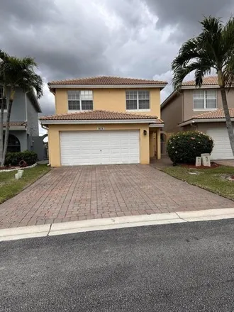 Rent this 3 bed house on 3267 Bollard Road in West Palm Beach, FL 33411