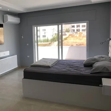 Rent this 3 bed condo on Amman