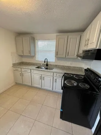 Image 2 - 3715 North 57th Street, East Lake-Orient Park, FL 33619, USA - House for rent