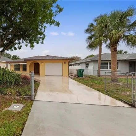 Rent this 3 bed house on 757 96th Avenue North in Collier County, FL 34108