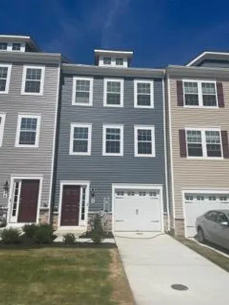 Rent this 4 bed townhouse on 26 AXIOS WAY