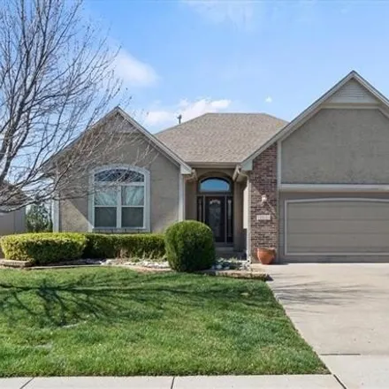 Buy this 3 bed house on 1544 Ventor Lane in Raymore, MO 64083