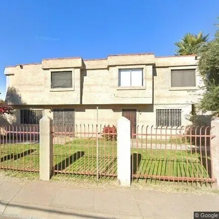 Rent this 3 bed townhouse on 4047 West Palomino Road in Phoenix, AZ 85019