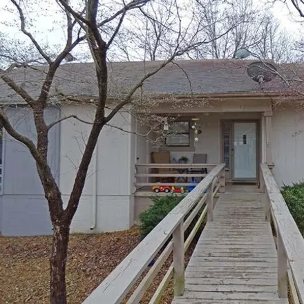 Buy this 2 bed townhouse on 32 Tenkiller Ln in Cherokee Village, Arkansas