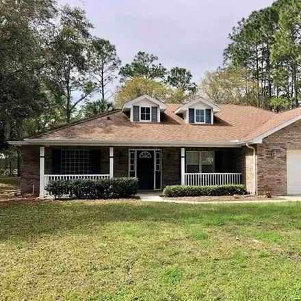 Rent this 3 bed house on 2 Piedmont Drive in Palm Coast, FL 32164