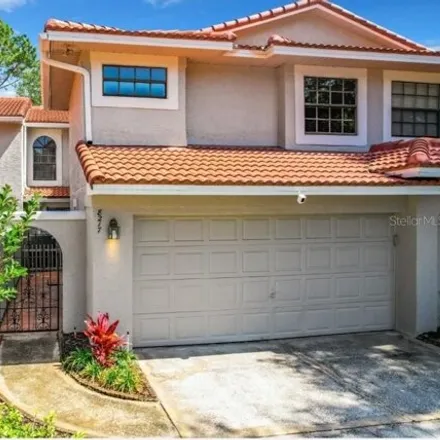 Rent this 3 bed townhouse on Breeze Cove Lane in Doctor Phillips, FL 32819