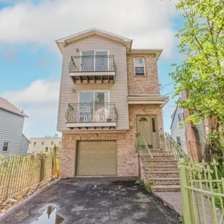 Buy this 7 bed house on 184 Palm Street in Newark, NJ 07106