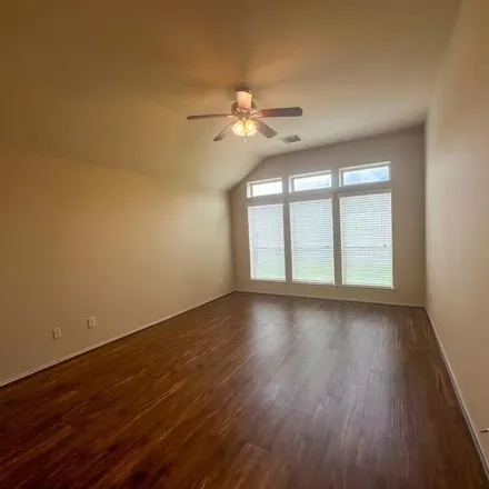 Rent this 4 bed apartment on 4063 Windmill Creek Drive in Fort Bend County, TX 77407