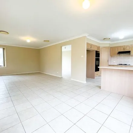 Rent this 4 bed apartment on Waterford Way in Glenmore Park NSW 2745, Australia