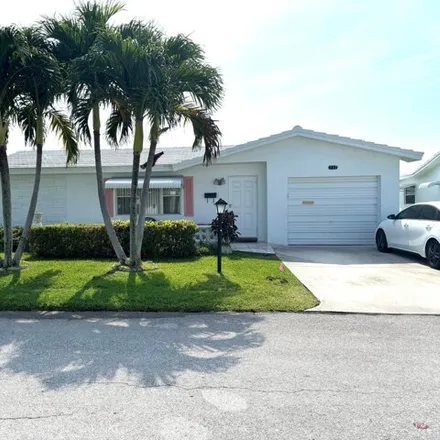 Rent this 2 bed house on Palm Beach Leisureville Golf Course in Southwest 19th Street, Boynton Beach