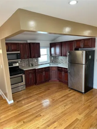 Rent this 3 bed house on 122-07 142nd Place in New York, NY 11436